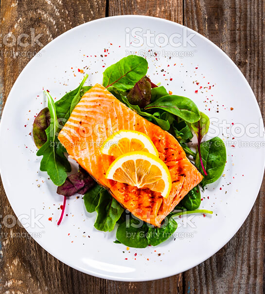 Grilled Salmon On Fresh Vegetabales